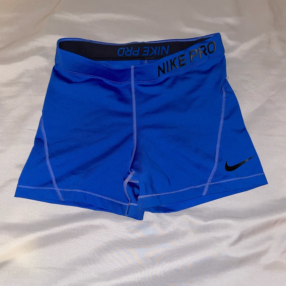 Blue medium Nike spandex shorts.